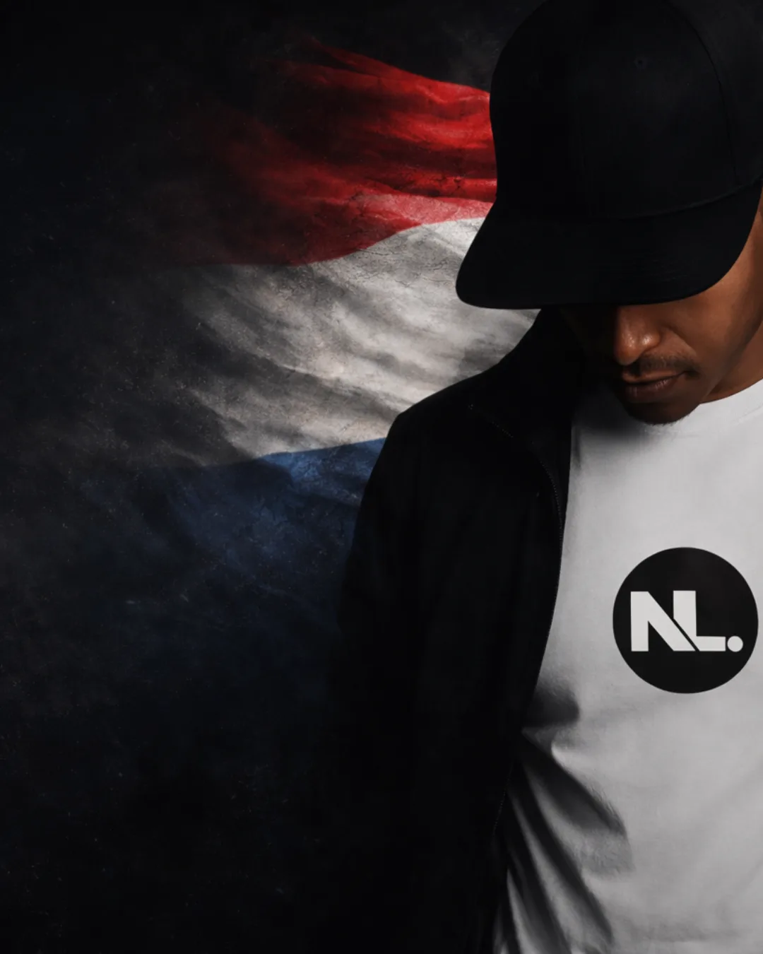 Person in dark attire with flag