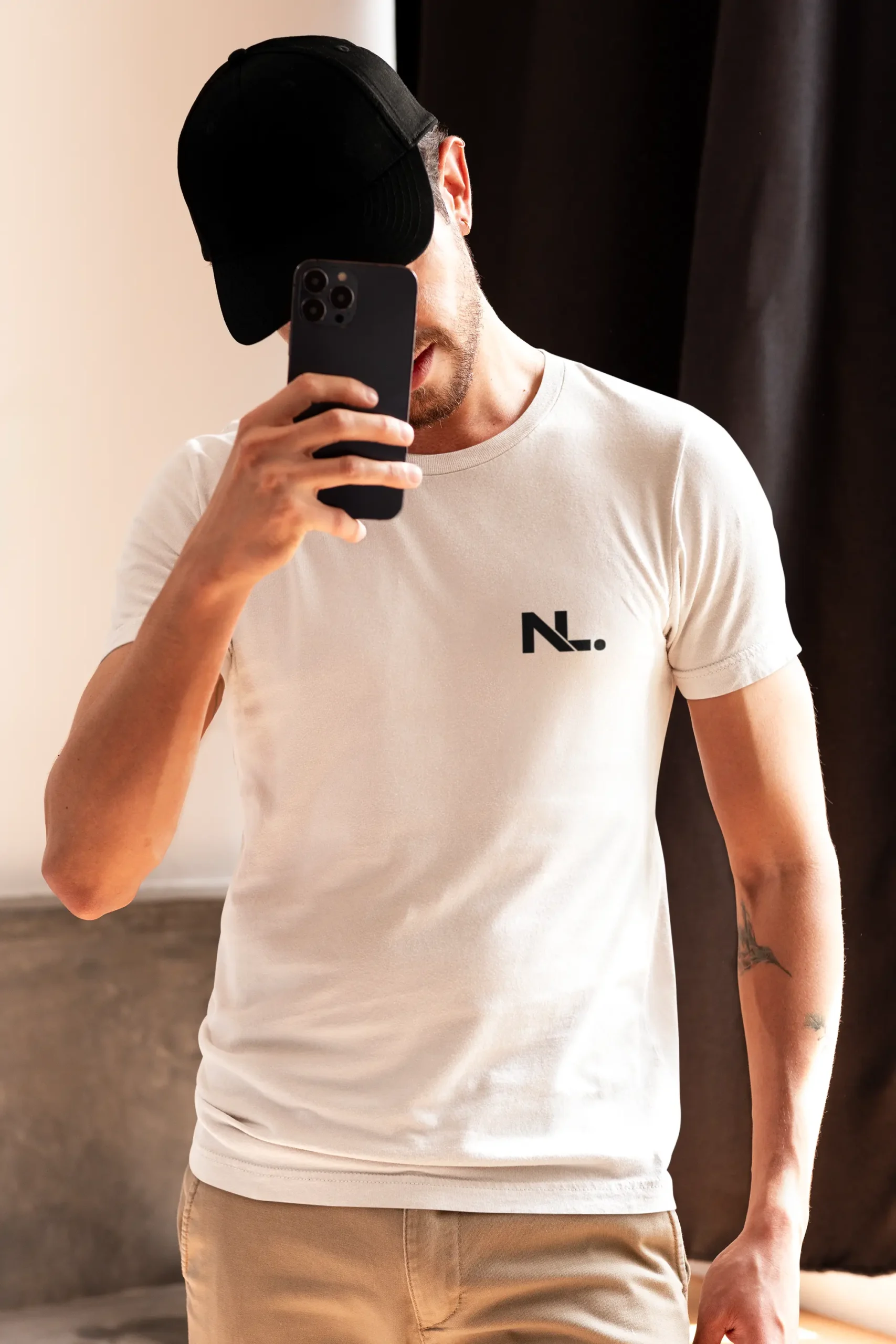 Dutch Man in white shirt taking selfie