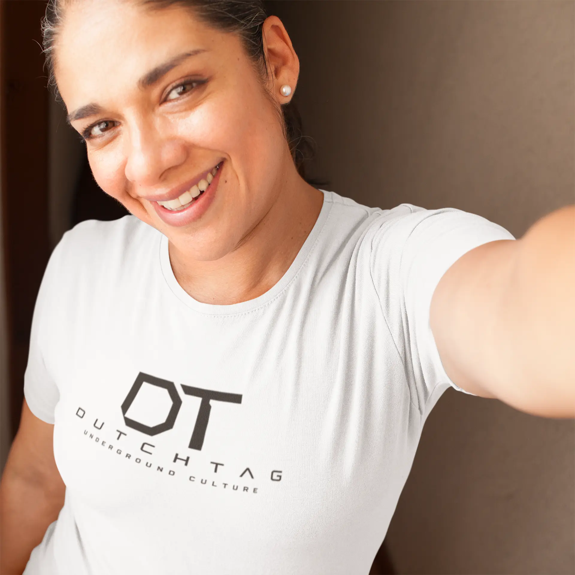 Smiling woman in a white t-shirt